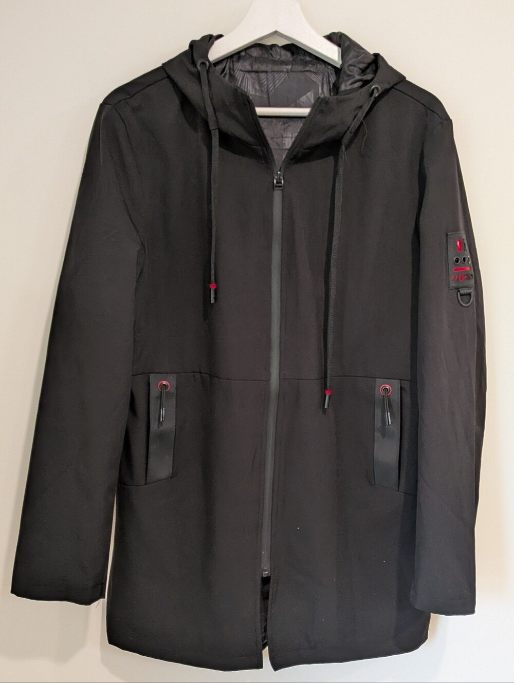 Lighweight Men's black rain jacket minimalist urban outdoor utility